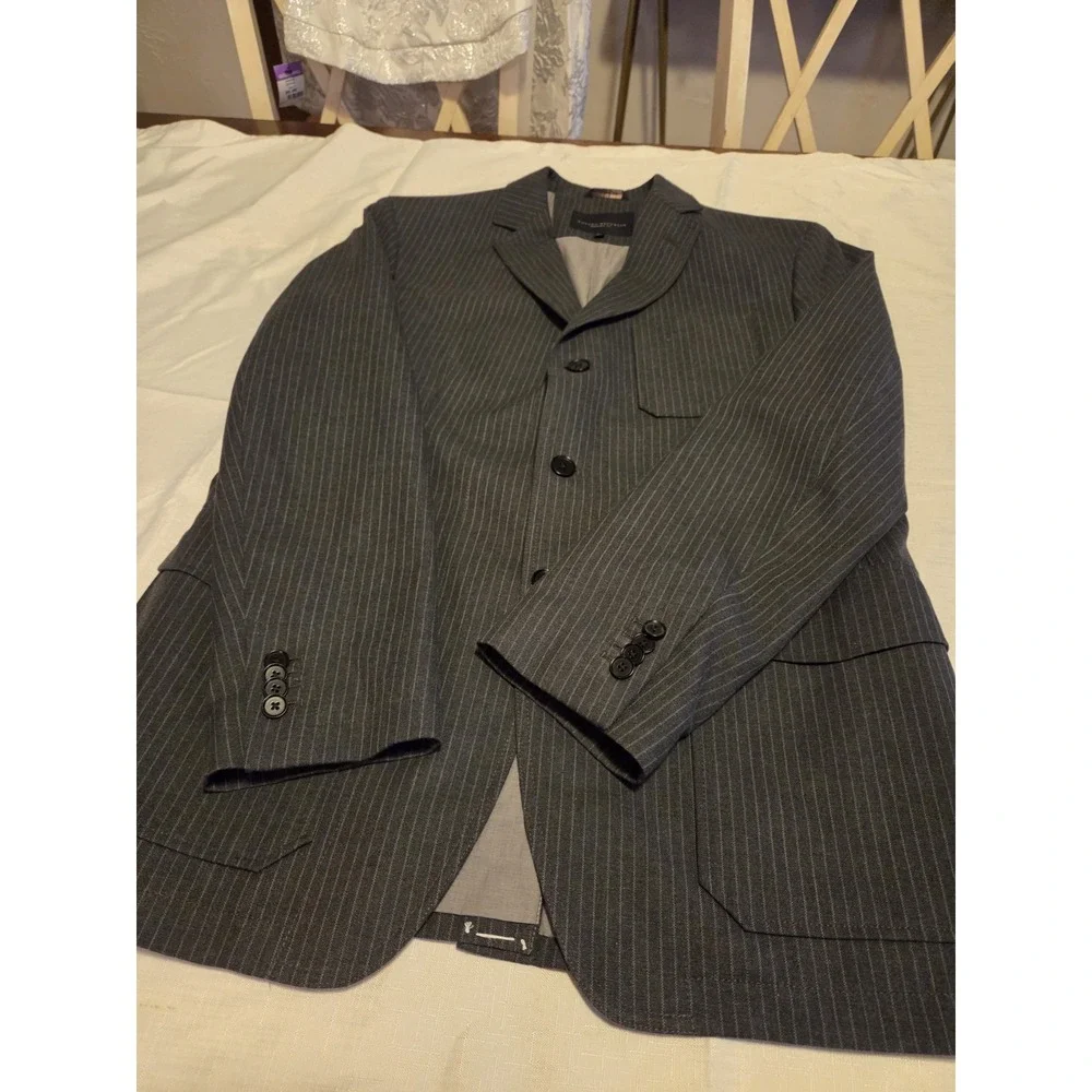 Banana Republic Modern Fit suit jacket in a classic gray pinstripe pattern,...
